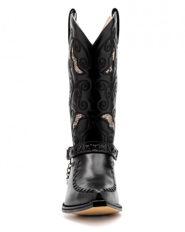 Buy online the new Sendra cowboy boots for men in black leather with decorative harness and snakeskin details.